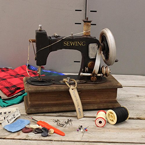 Vintage estilo antiguo adorno de modelo de máquina de coser con joyer