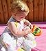 Spiral cot activity toy in gorgeous orange super soft cheeky monkey design