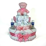 La tarta se entrega envuelta en papel celofán con un lazo de raso a juego para regalo. Original y muy útil para regalos de recién nacidos, baby showers, bautizos etc...