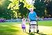 Produktbild Alu-Dibond-Bild 90 x 60 cm: "Grandmother with walker and little girl in a park", Bild auf Alu-Dibond
