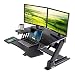 Produktbild EUREKA ERGONOMIC Adjustable Standing Desk, Ergonomic Sit-Stand PC Desk Converter, Gas Spring Monitor Riser, Extra Large Table Top Stand-Up Desk, with Detachable Keyboard Tray for Computer & laptop