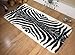 Zebra animal print faux fur sheepskin oblong rug 70 x 140 cm