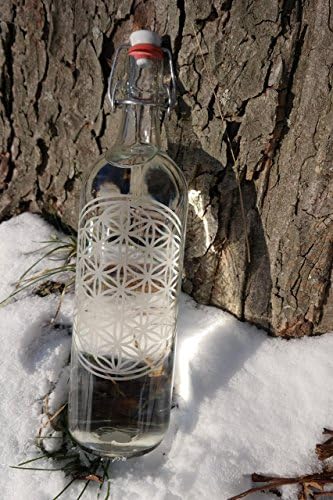 Bottle with the flower of life and a ceramic swing top