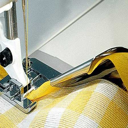 Preisvergleich Produktbild Husqvarna-Viking Bandeinfasser 12mm