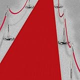 moqueta roja La alfombra es de TNT (Tejido no tejido). Es una mezcla entre papel y tela.