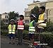 Produktbild Tofern High Visibility High Viz Adjustable children Pupils Junior Senior student reflective safety vest for Running Cycling Walking Skating Skiing Skateboarding (S, GRÜN)