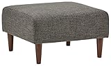 Esta bonita otomana sirve como reposapiés, mesa auxiliar para poner una bandeja o cómodo asiento adicional para las visitas. Las  robustas patas de madera le confieren a esta otomana un estilo Mid-century Modern. Ancho: 66 x fondo: 65 x alto: 39,8 cm. Estructura de madera con fuertes patas de madera de haya. El estilo Mid-century Modern pone un toque retro en tu salón. Montaje sencillo: solo hay que fijar las patas desde el compartimento con cremallera de la parte inferior. Devolución gratuita durante 30 días y 1 año de garantía.