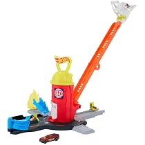 Hot Wheels - Boutique de bonbons, Set de piste avec rampe, Véhicule en Forme de Donut en Échelle 1:64 Inclus et Speed Snap Track, Jouet pour Enfants, 3 Ans, JBM62