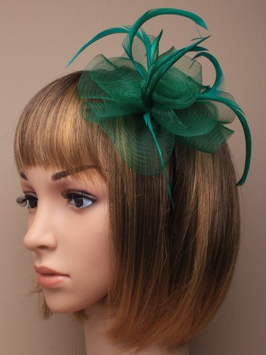 Green net and feather hair fascinator on a slim alice band ,suitable for weddings, races, prom