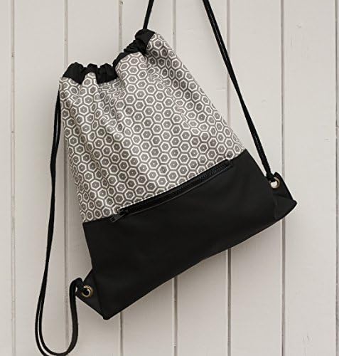 Vinyl backpack. Black backpack. Vinyl fabric. Backpack with cord handles. Drawstring backpack. Travel backpack. Grey and white