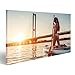 Produktbild islandburner Bild Bilder auf Leinwand Frau auf Stand up Paddle Board. Spaß Beim Sup-Board während des Sonnenuntergangs. Aktiver Lebensstil. Wandbild, Poster, Leinwandbild GJE