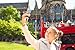 Produktbild Leinwand-Bild 110 x 70 cm: "Smiling girl taking selfie in Glasgow historical place. Travelin", Bild auf Leinwand