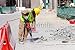 Produktbild Alu-Dibond-Bild 50 x 30 cm: "A laborer uses a jackhammer to break up a concrete pavement", Bild auf Alu-Dibond