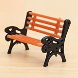 Este modelo de banco de parque es de alta simulación diseñado y hecho a mano, con asiento de banco naranja y espalda y brazos negros.