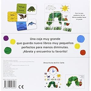 Una caja con muchos libros y un puzzle