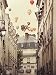 Produktbild Close Up Flying Over Paris Kunstdruck Irene Suchocki (46cm x 60cm) + Original tesa Powerstrips® (1 Pack/20 Stk.)