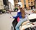 Produktbild Alu-Dibond-Bild 110 x 90 cm: "Young cheerful girl driving scooter in in european city", Bild auf Alu-Dibond