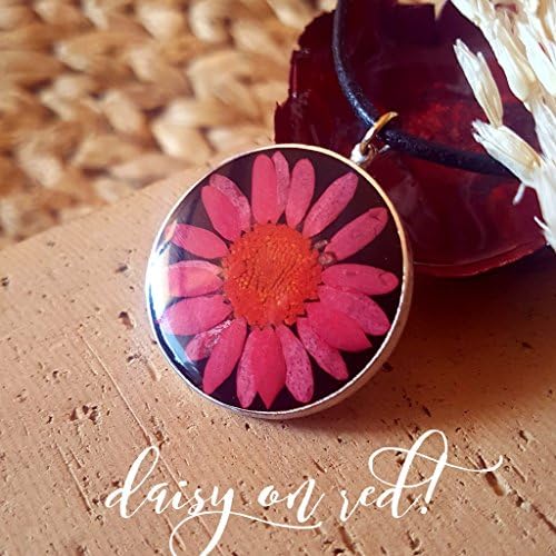 Wonderful and big pendant made in resin with a red daisy dry inside. Sterling silver. Exclusive pendant. Like you! High quality leather cord included in price.