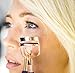A Gold Eyelash Curler with replacement cushion pads!
