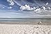 Produktbild Artland Poster oder Leinwand-Bild fertig aufgespannt auf Keilrahmen mit Motiv UtArt Einsamer Strand Landschaften Strand Fotografie Blau C3ZC