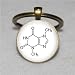 Produktbild Chemie Jewelry - Messing Biochemie Schlüsselanhänger - Schokolade Molekül - Theobromin Schlüsselanhänger, Biologie, Chemie Schlüssel Kette