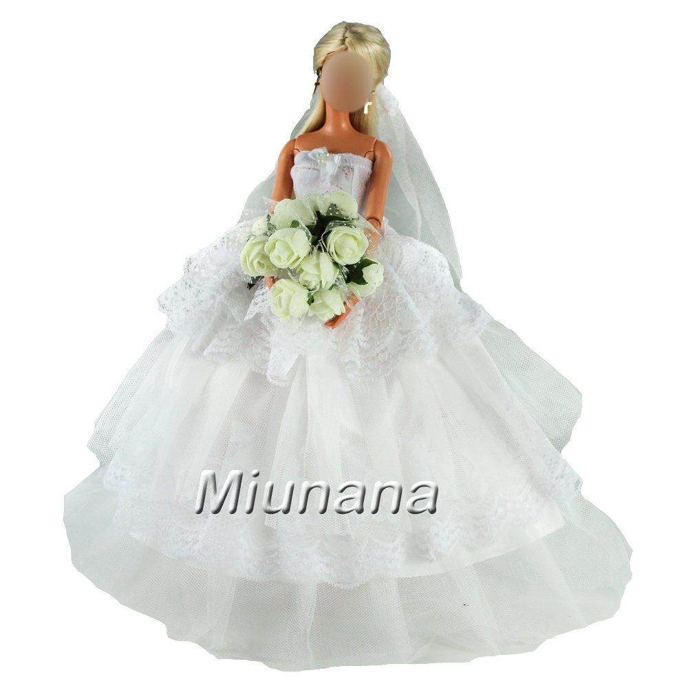 abito da sposa con velo