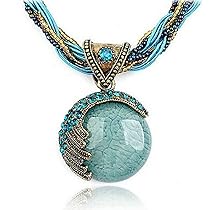 Collana con ciondolo a nodo d'amore etnica tibetana in ottone con perline intarsiate in turchese - Italia