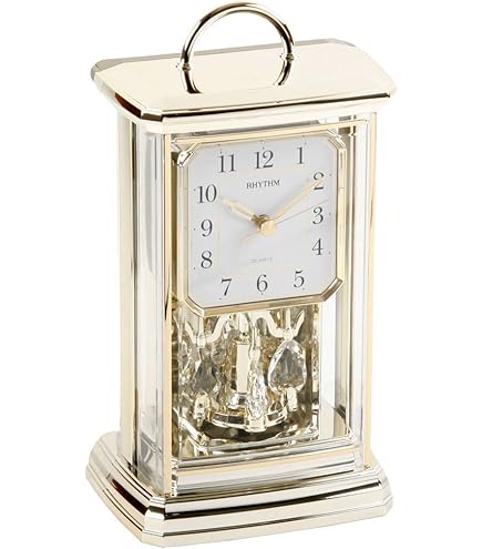 Rhythm Orologio Da Tavolo Classico Con Pendolo 7724/9 - Cassa In Plastica Dorata - 19,6 X 24 X 10,6 Cm