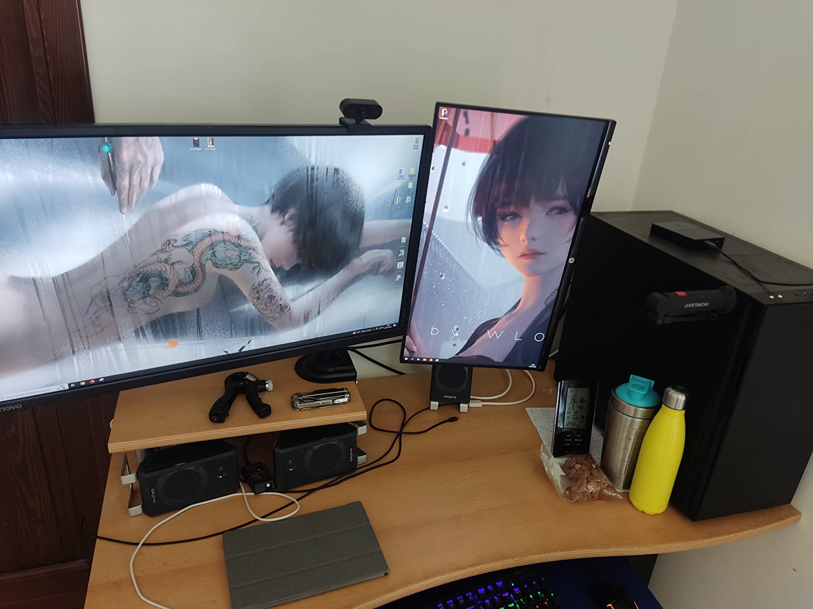 Dual monitor arm or two single monitor arms for one horizontal and one