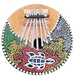 coconut kalimba instrument Fabricación artesanal y justo.