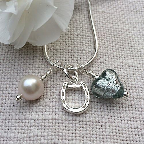 Diana Ingram three charm necklace with grey Murano glass mini heart (10mm), silver horseshoe and white freshwater pearl on Sterling Silver snake chain.