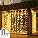 Produktbild LED Lichtervorhang Sinobest Niederspannung LED Lichterkette 300 LEDs 3m x 3m IP44 Wasserfest Lichterkettenvorhang für Weihnachten Deko Party Festen, Innen, 8 Fernbedienung Leuchtmodi (Warmweiß)