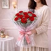 The FloralMart Fresh Flowers Bouquet of 08 Red Roses in Stylish Cellophane Wrapping with Seasonal Fillers and Gypso, for Birt