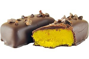 ‎EDELMOND 100g. Edelmond Quitte Kurkuma Praline. Nur Honig als Süße, sonst ohne Kristallzucker. Mit dunkler Schokolade überzogen. Herbe Marzipan Süßigkeit.