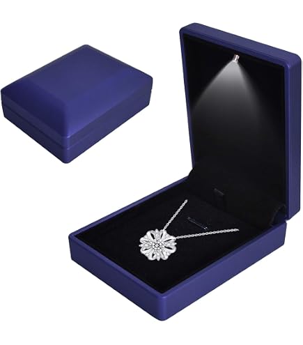 Un Anello Di Fidanzamento Con Diamanti .in Una Scatola Con Bagliore