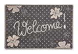 Die Türmatte hat eine Größe von ca. 59 x 39 cm, sie ist rechteckig mit einer geschwungenen Welcome Aufschrift, umrahmt von Glücksklee Motiven