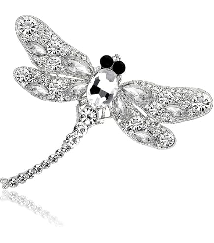 Lot - Christian DIOR Deux broches en métal doré et strass figurant des