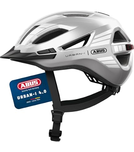 ABUS Stadthelm Hyban 2.0 MIPS - Fahrradhelm für den Alltag mit Rücklicht, ABS-Hartschale, Aufprallschutz - für Damen und Herren - Gelb Glänzend, Größe M