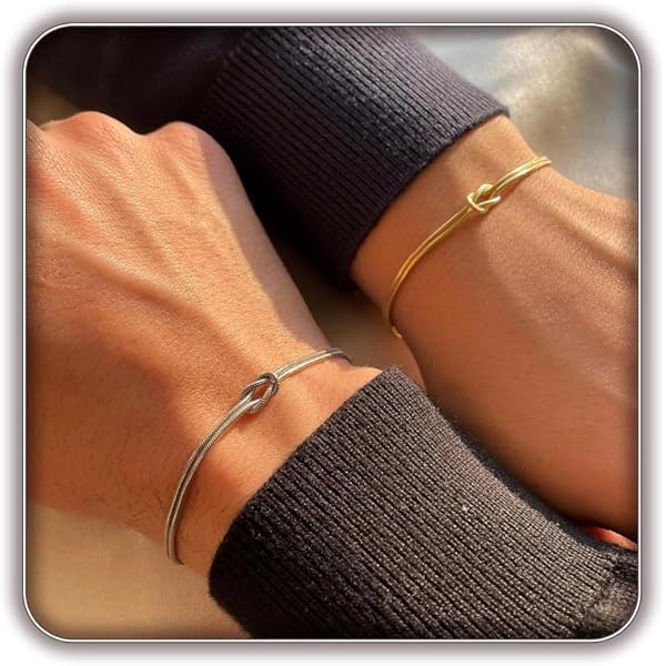 BRACCIALE DONNA IN ACCIAIO IP GOLD CON NODO E ZIRCONI BIANCHI