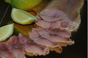 INKE 1 kg - Muggine affumicato prodotto dall'artigiano sardo Pino Spanu di Tharros Pesca a Cabras. Paese famoso per le sue zone umide e per le peschiere di muggine sardo