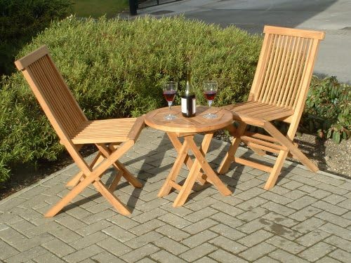 HUMBER TEAK 3 PIECE BISTRO SET COMPRISING ROUND OUTDOOR GARDEN PATIO BISTRO TABLE AND TWO FOLDING CHAIRS. CONSTRUCTED FROM A GRADE TEAK