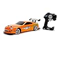 Jada Toys Fast & Furious 1995 Toyota Supra Turbo RC Drift Car with 4-Wheel Drive, 2-Channel Radio Remote Control, USB Charging Function & 4 Spare Tyres, 1:10 Scale, Orange
