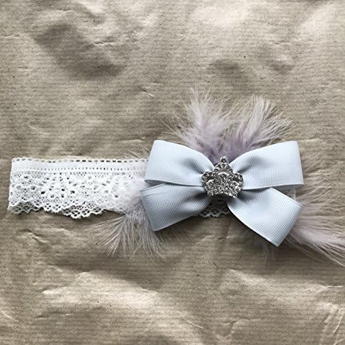 Beautiful handmade princess silver grosgrain bow with diamate crown and lilac feathers