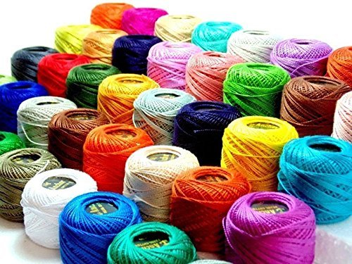 50 pelotes de coton nacré Anchor N°8 (85 mètres chacune).