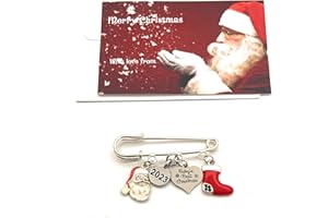 LIBBY'S MARKET PLACE Baby's First Christmas 2023 Keepsake Brooch with Santa and Stocking Charms (Organza Gift Bag)