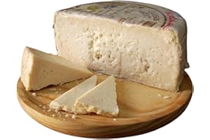 QUEJARA 1/2 QUESO ROMERO OCAÑA para paladares exquisitos, graso, mantecoso, con pique, granuloso y quebradizo, color ocre, debido a su larga maduración de hasta 2 años