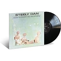 Aja: Steely Dan: Amazon.in: Music}