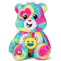 Bring joy with the Care Bears Unlock The Magic Togetherness Rainbow Winking Bear! This 12 multi-coloured plush is perfect for all ages 3 and up. Snuggle up with your new cuddly friend