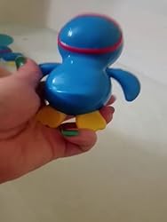 munchkin wind up swimming penguin bath toy