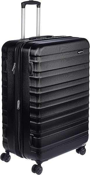 Amazon Basics 30" Hardside Large Checked Luggage, Hardshell Suitcase With Four Multi-directional Wheels, Expandable For Up to 15% More Space, Scratch-Resistant Shell, Black - 1